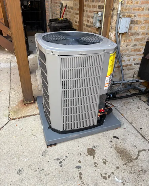 New outdoor air conditioner at the back of a building